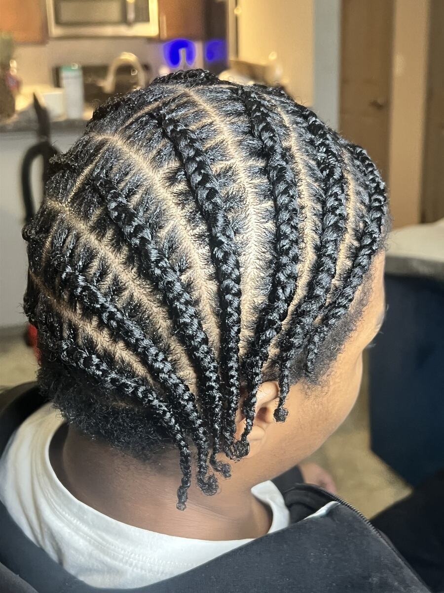 Straight-back cornrows with even parts, back view
