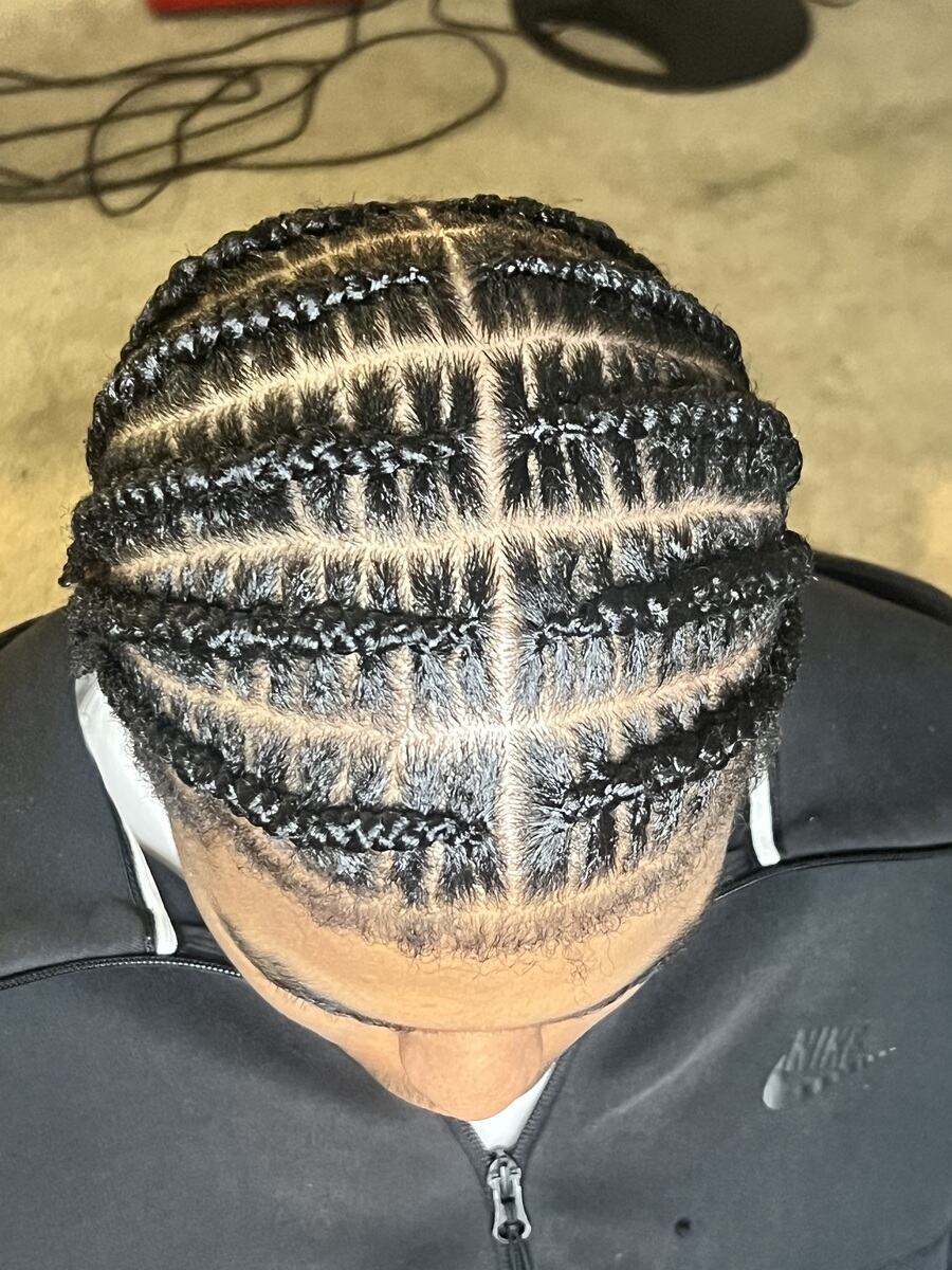 Cornrows braided in a box grid pattern, overhead view