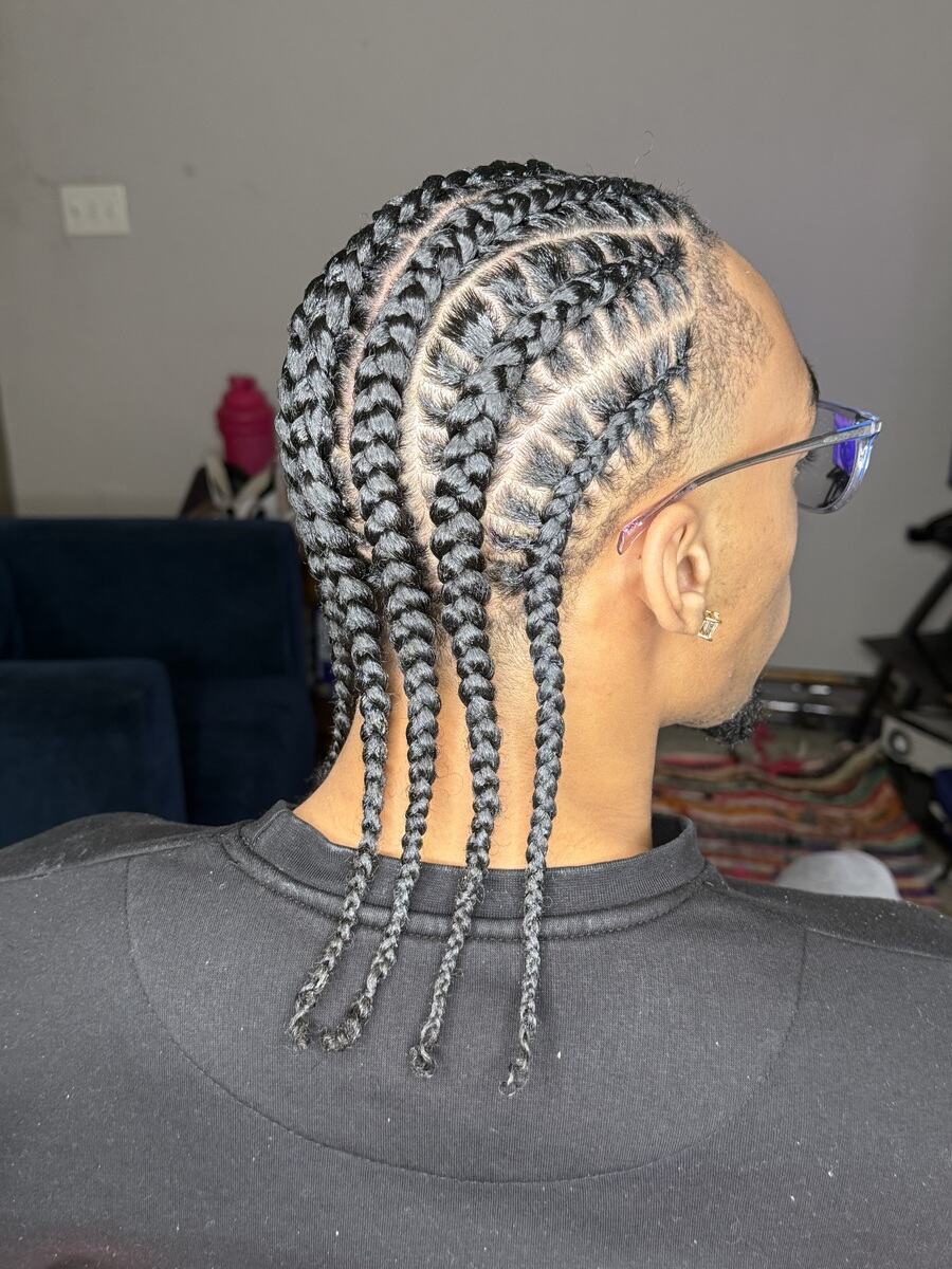 Four feed-in cornrows braided straight back, back view